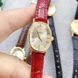 Elegant oval quartz watch for women with red leather strap and clear dial markers for daily use.