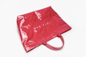Red patent glossy tote bag large capacity waterproof shoulder handbag for women daily commuting.