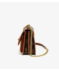 Detailed side view of the luxury monogram shoulder bag featuring a chic gold chain strap.