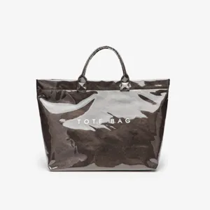 Glossy waterproof dark tote bag detail showing smooth surface and durable dual handles.