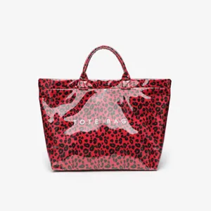 Stylish red black leopard print waterproof tote bag, large capacity daily commuting bag.