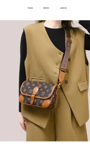 Detailed view of the stylish leather monogram shoulder baguette bag for women, trendy and elegant.