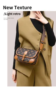 Classic retro leather shoulder bag detail showing monogram pattern, metal hardware, and strap.