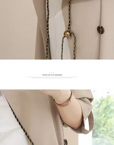 Detail view of the luxury leather quilted chain phone bag with chic metal hardware.