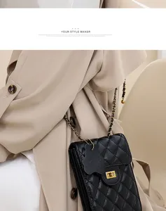 Black quilted mini chain phone bag with metal hardware and stylish shoulder strap design.