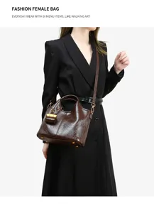 Classic genuine leather shoulder bag for women, stylish tote bag with small pouch detail.