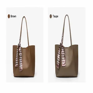 Detailed view of large capacity commuting tote bag with elegant silk scarf decor available in brown.