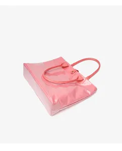 Detail view of the pink patent leather tote bag, showcasing large capacity and smooth texture.