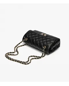 Detail view of a classic black quilted leather chain shoulder bag with elegant gold turn-lock.