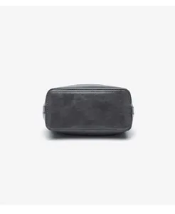 Detailed view of the dark grey leather women's shoulder bag bottom with neat stitching.