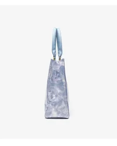 Detailed side view of the waterproof DuPont paper casual shoulder tote shopping bag in blue.
