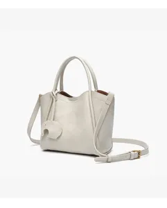 Minimalist women PU leather crossbody handbag tote bag with cute elephant pendant detail