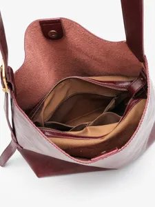 Burgundy leather hobo shoulder bag with zipper compartments for women daily commute chic