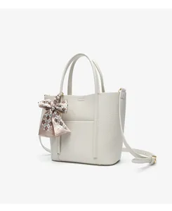 Fashion versatile genuine leather tote bag with chic bow ribbon scarf, elegant crossbody design.