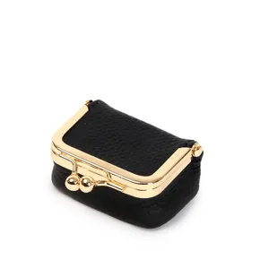 Mini black leather clasp coin purse jewelry box detail view for rings and earrings.