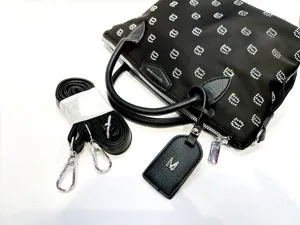Black rhinestone handbag with detachable strap and chic sparkling design for women daily use.