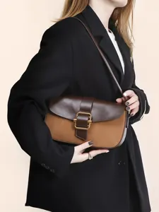 Chic women color-block saddle shoulder bag, stylish leather patchwork underarm bag for winter.