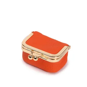 Mini orange leather kiss lock pouch for jewelry ring storage portable coin purse detail