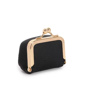 Mini black leather kiss-lock coin purse closeup, compact jewelry storage box detail view.