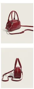 Red patent leather bowling bag detail, small crossbody purse with dual top handles.