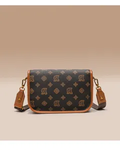 Detailed view of women's retro brown shoulder bag with monogram print and chic leather trim.