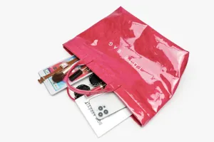 Detailed view of the large-capacity waterproof DuPont paper tote bag in glossy pink finish.