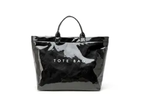 Waterproof black glossy tote bag, large capacity stylish handbag for commuting and daily use.