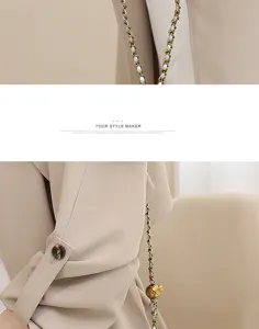 Mini chain shoulder crossbody bag with elegant quilted leather design and luxury gold ball hardware.