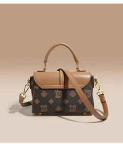 Retro women's top-handle crossbody bag with classic monogram print and leather flap.