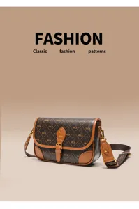 Detailed view of the vintage brown monogram shoulder bag with luxury style and metal buckle.