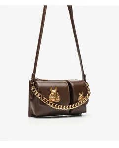 Brown crossbody bag with golden chain and rabbit metal decor for women, detailed product view.