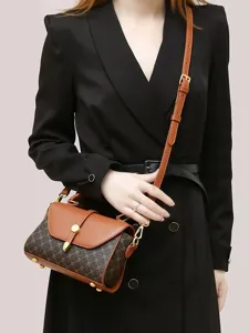 Chic retro women's shoulder bag with classic monogram print and brown leather flap.