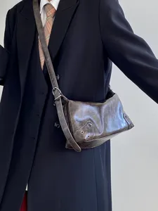 Vintage brown underarm shoulder bag for women, retro PU leather crossbody bag, 2024 trendy.