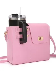 Pink leather water bottle crossbody bag with black insulated tumbler for outdoor travel