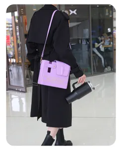 Stylish purple crossbody cup bag with crocodile texture flap, perfect for outdoor travel.
