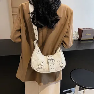 White crocodile embossed PU leather crescent underarm shoulder bag with metal hardware.