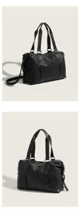 Black large capacity travel duffel bag, casual leather-look tote with shoulder strap.