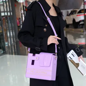 Fashion purple water bottle bag crossbody shoulder PU leather bag for women outdoor daily use.