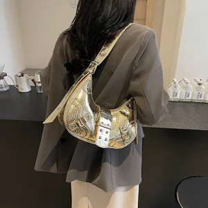Metallic gold crocodile texture hobo shoulder bag with edgy metal buckle and rivet details.