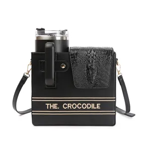 Black crossbody water bottle bag detail, crocodile texture flap, tumbler holder pouch.