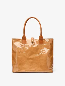 Stylish brown DuPont paper tote bag with leather handles and snap closure for women.