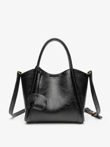 Black leather handbag, stylish bucket tote bag with top handle and crossbody strap for women.