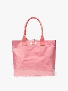 Pink DuPont paper tote bag for women, large capacity casual commuting handbag for daily use.