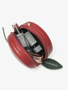 Red apple shaped round cross body bag PU leather purse with green leaf tag and cosmetic capacity.
