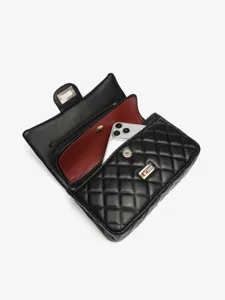 Elegant black quilted leather crossbody shoulder bag featuring gold hardware and open view.