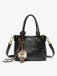 Stylish black top handle shoulder bag with a chic charm pendant for daily casual use.