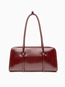 Minimalist burgundy patent leather handbag vintage style bowling bag for women daily fashion.
