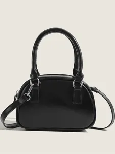 Classic black bowling bag for women, stylish minimalist PU leather handbag with crossbody strap.