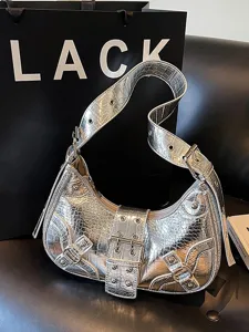 Silver crocodile pattern motorcycle shoulder bag, trendy crescent rivet armpit bag for women.