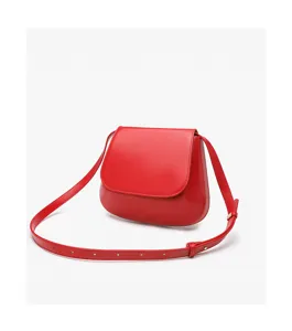 Red leather saddle bag detail, retro crossbody strap and smooth flap closure for women.